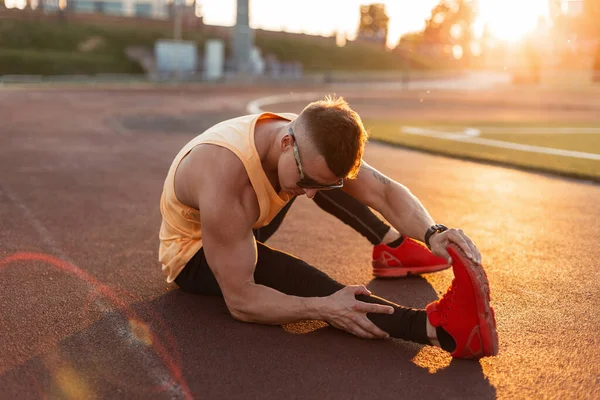 Handsome Young Athlete Man Sunglasses Sportswear Red Sneakers Sitting Doing — ストック写真