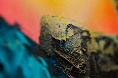 Sarı ve mavi renkte yağlı boya ve fırça darbeleriyle renklendirilmiş inanılmaz bir arka plan.