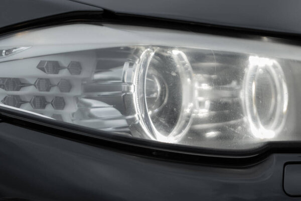 Headlight with optics, LED and details. Car with headlight