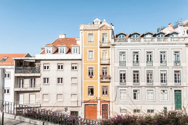 Vintage beautiful apartment house with windows in Lisbon, Portugal. Real Estate and Housing