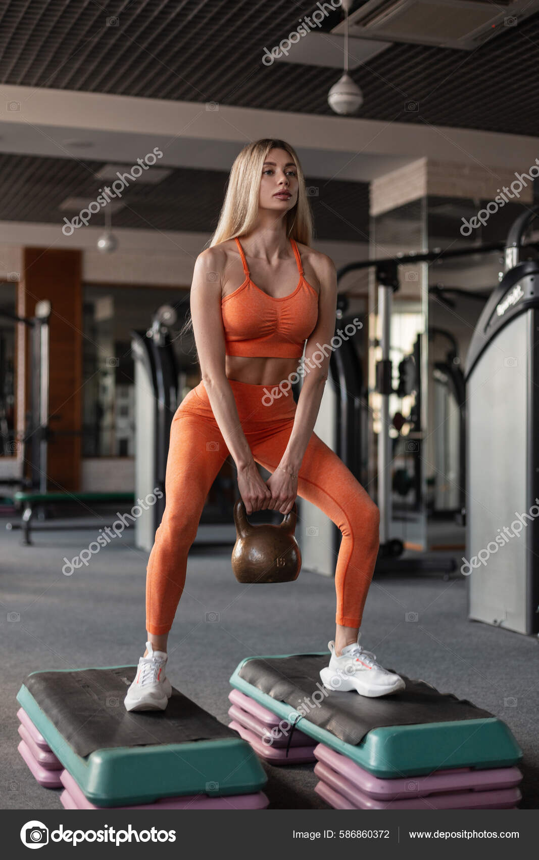 Sexy Strong Beautiful Fitness Blonde Woman Orange Sportswear