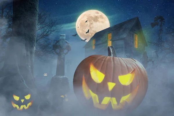 Halloween wallpaper. Abandoned scary house near the cemetery in the forest with pumpkins, a full moon, bats and fog. Pumpkins In Graveyard In The Spooky Night,