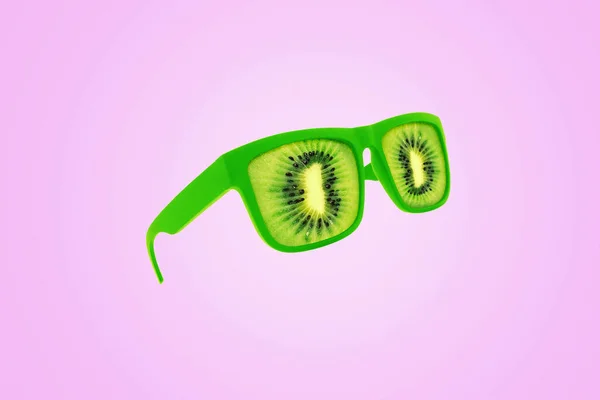 Kreatywne Zielone Okulary Kiwi Wiszące Nad Pastelowym Różowym Tłem Kreatywny — Zdjęcie stockowe