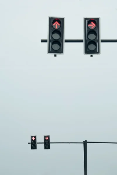 Traffic lights on a pole (red), straight and turn right directio — Stock Photo, Image
