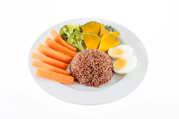 Makanan vegetarian, berisi beras kasar, telur, wortel, labu dan — Stok Foto