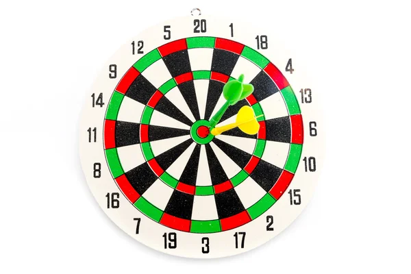 2 dart grön och gul färg rätt på mål — Stockfoto