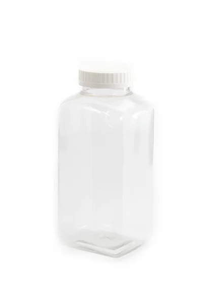 Квадратная прозрачная пластиковая бутылка с белым покрытием сверху — стоковое фото