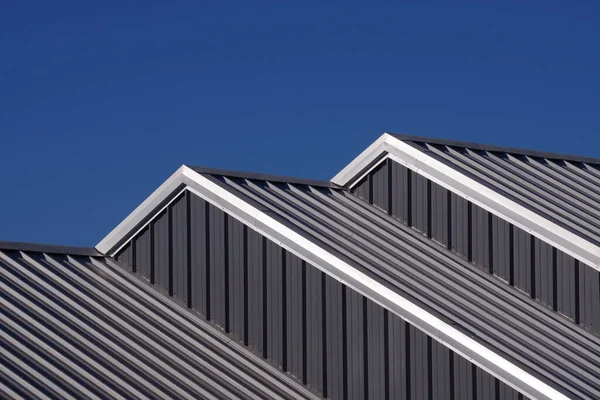Partial View Cascading Warehouse Rooftops Blue Sky Fotografias De Stock Royalty-Free