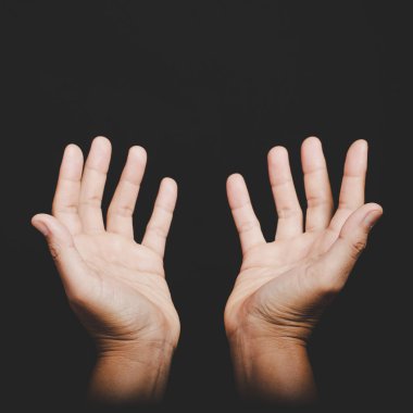 Close up Asian christian woman hands person pray and worship for thank god in church with black background, The concept for faith, spirituality and religion