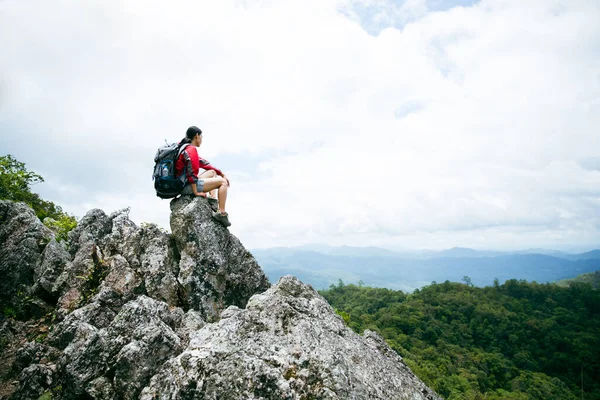 Young Person Hiking Female Sitting Top Rock Backpack Woman Looking — Fotografia de Stock