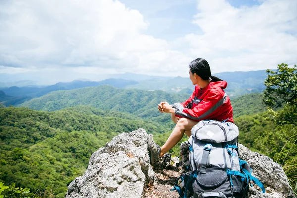 Young Person Hiking Female Sitting Top Rock Backpack Woman Looking — Foto de Stock