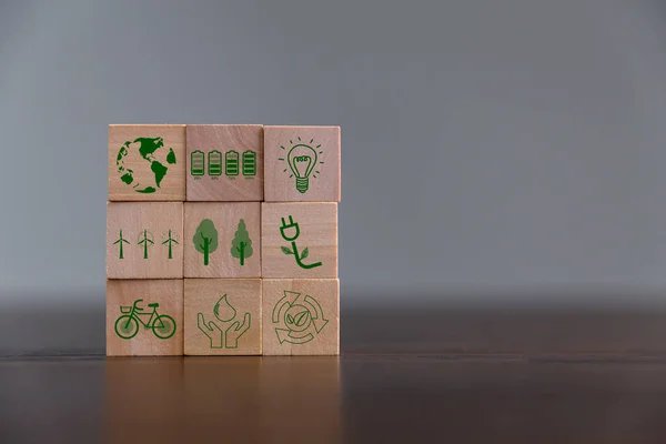 Companies are targeting net zero greenhouse gas emissions. Carbon credit concept.Tradable certificate to drive industry in direction of low emissions in efficiency cost. Wooden cubes with decrease CO2