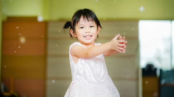 Happy Little Girl Playing Soap Bubbles Living Room Joyful Kid — Stock Photo, Image