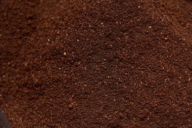 Kahve dokusunu öğütüyor. Kahve karışımı, öğütülmüş ya da hazır kahve. arkaplan