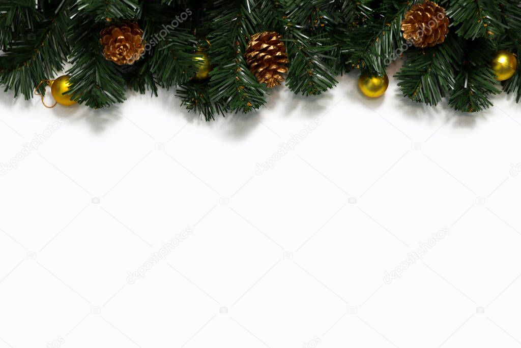 Christmas background with christmas decoration at top on white background. greeting card. Winter holiday theme. Happy New Year. Space for text