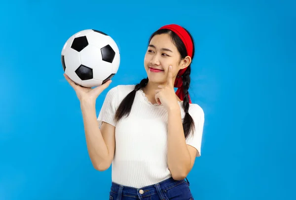 Asian Young Woman Isolated Blue Background Holding Soccer Ball Football — Stok fotoğraf