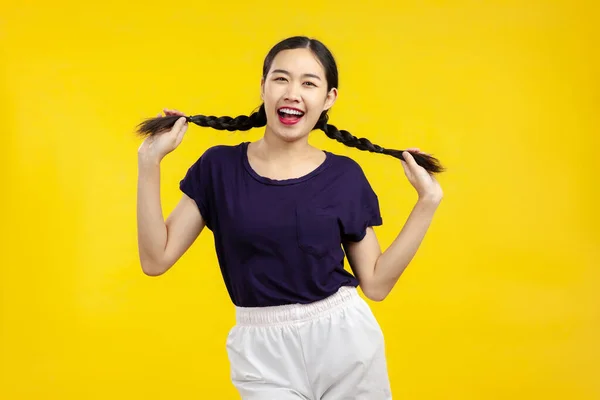 Photo Happy Young Asian Woman Wear Black Shirt Isolated Yellow — Stock Photo, Image