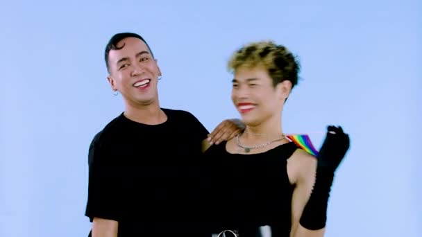 Two Happy Gay Holding Pride Rainbow Flag Isolated Blue Color — 비디오