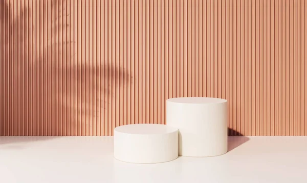 3d background white cylinder stand for product or cosmetic showcase leaves shadow on the orange pastel stipped wall.