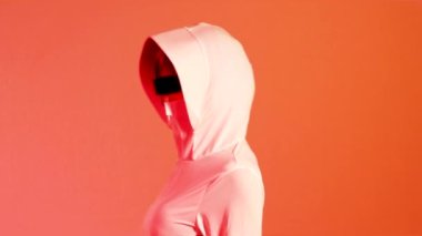 Metaverse concept, young asian woman short blue silver hair wearing white vr headset touching on the red color background. 4K video asian girl futuristic style gamer.