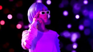 young asian woman wearing white shirt and 3d glasses on motion 3d background. 4K video Metaverse concept asian girl futuristic style