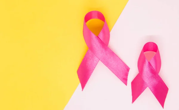 Pink Ribbon Breast Cancer Awareness Symbol Isolated White Yellow Background — Zdjęcie stockowe