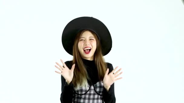 Halloween Theme Asian Woman Black Dress Witch Hat Posing Smiling — Stock Video