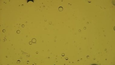 Ağır çekimde yağ kabarcıkları, gradyan aydınlatma, makro