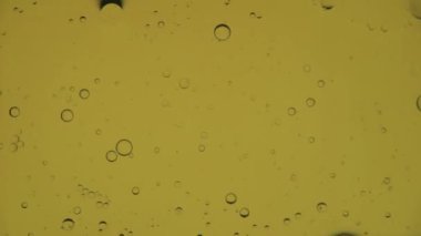 Ağır çekimde yağ kabarcıkları, gradyan aydınlatma, makro