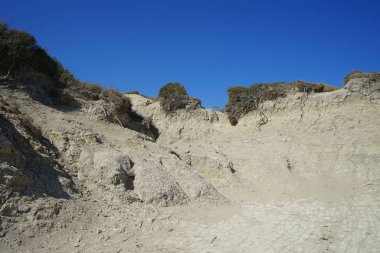 Beautiful mountain landscape with drought-resistant vegetation at Theotokos hill in Kolimpia, Rhodes, Greece 