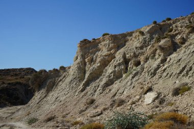 Beautiful mountain landscape with drought-resistant vegetation at Theotokos hill in Kolimpia, Rhodes, Greece 