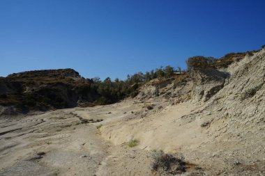 Beautiful mountain landscape with drought-resistant vegetation at Theotokos hill in Kolimpia, Rhodes, Greece 