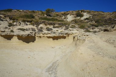 Beautiful mountain landscape with drought-resistant vegetation at Theotokos hill in Kolimpia, Rhodes, Greece 