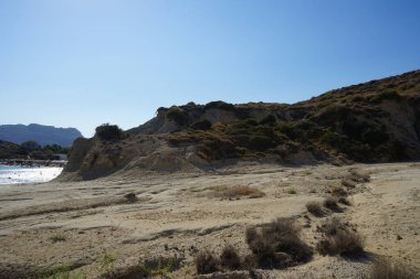 Beautiful mountain landscape with drought-resistant vegetation at Theotokos hill in Kolimpia, Rhodes, Greece 