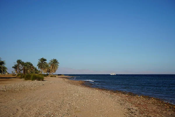 A ship on the Red Sea in the Gulf of Aqaba. Dahab, South Sinai Governorate, Egypt  