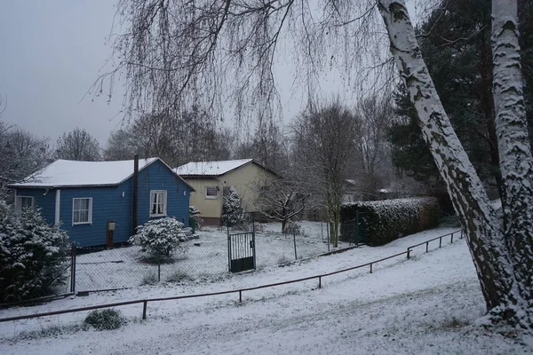 Garden houses under the snow in winter. Berlin, Germany