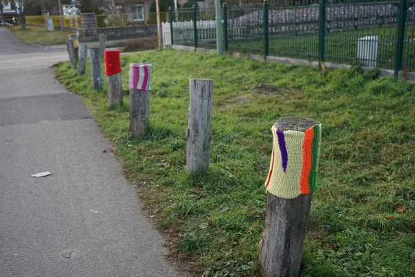 Boundary Roadside Poles Decorated Knitted Products Background Grass Hoarfrost December — стоковое фото