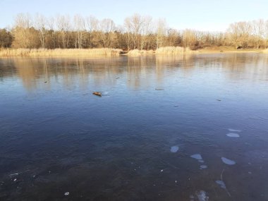 Ice on the Habermannsee lake in December. Kaulsdorfer Baggersee, Marzahn-Hellersdorf, Berlin, Germany 