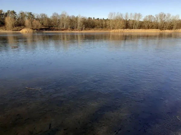 Ice on the Habermannsee lake in December. Kaulsdorfer Baggersee, Marzahn-Hellersdorf, Berlin, Germany