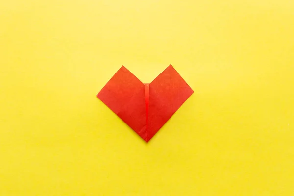 Покрокова інструкція як зробити орігамі легким серцем . — стокове фото