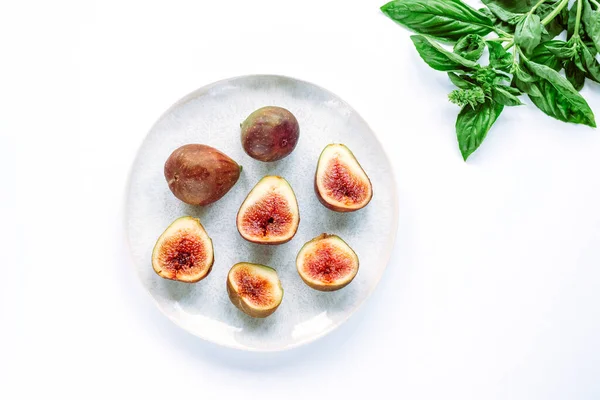 Fresh Ripe Figs Plate Basil Leaves White Table Top View — Stockfoto