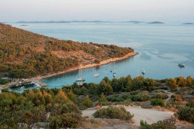 Beautiful view of the sea bay with islands before sunset. Murter, Croatia.