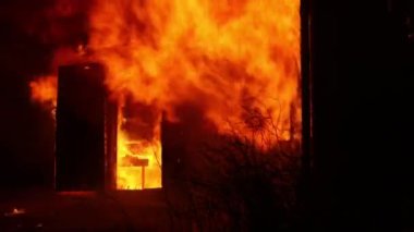 Burning house. Old wood house is burning. Fire