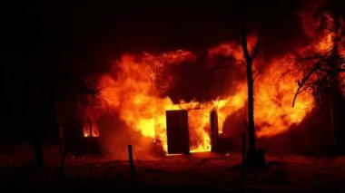 Burning house. Old wood house is burning. Fire