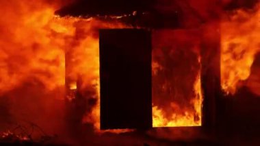 Burning house. Old wood house is burning. Fire