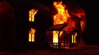 Burning house. Old wood house is burning. Fire