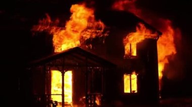 Burning house. Old wood house is burning. Fire