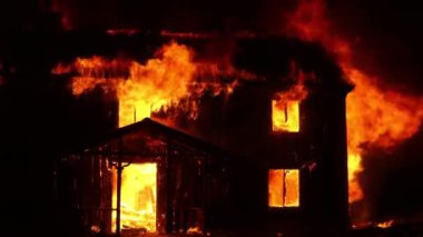 Burning house. Old wood house is burning. Fire