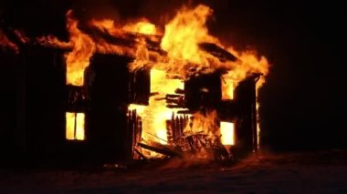 Burning house. Old wood house is burning. Fire