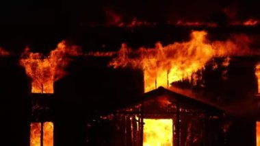 Burning house. Old wood house is burning. Fire